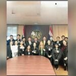 Health minister denies favouritism in photos with Chinese students