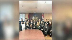 Health minister denies favouritism in photos with Chinese students