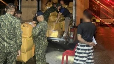 Drivers held for transporting 1,434 boxes of illegal cigarettes