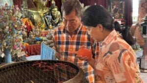 Woman wins 190,000 baht lottery after shrine visit