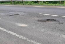 Large pothole on Chok Chai-Det Udom Road causes vehicle damage