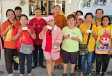 Chon Buri villagers celebrate big lottery win with monk’s blessing