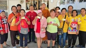 Chon Buri villagers celebrate big lottery win with monk’s blessing