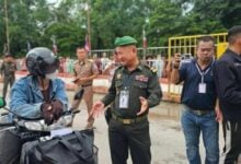 Cambodian motorbikes blocked at border in retaliation over fuel ban