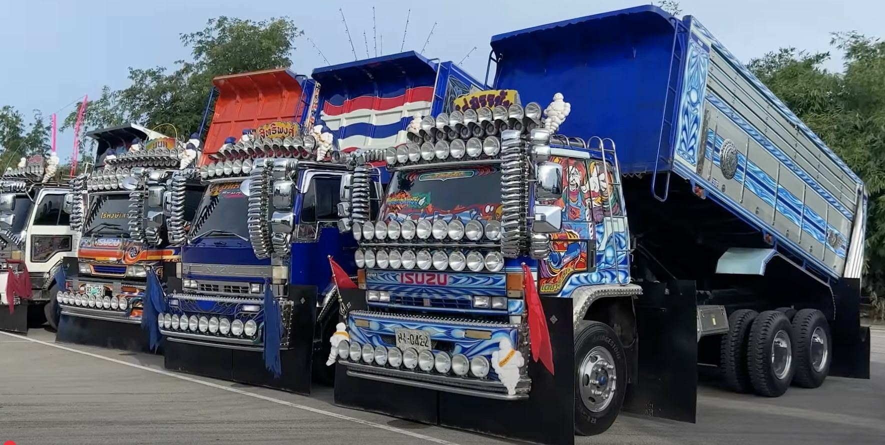 Why trucks and buses in Thailand are moving works of art