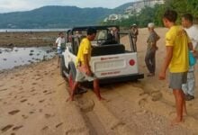 Tourist fined 5,000 baht after jeep stuck on beach in Phuket