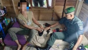 Koh Phangan police arrest two for drugs and firearms offences