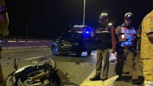 Motorcycle crash with Mercedes-Benz kills two young men in Pathum Thani