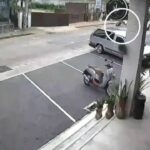 Motorcycle crash in Pattaya due to unsecured gate leaves two injured | Thaiger