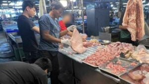 Ham-fisted: Cambodian couple busted for illegal pork stall in Bangkok
