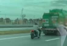 Dozing motorcyclist survives after slamming into truck on motorway