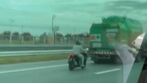 Dozing motorcyclist survives after slamming into truck on motorway