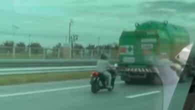 Dozing motorcyclist survives after slamming into truck on motorway
