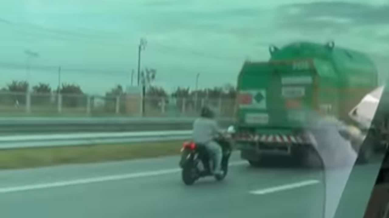 Dozing motorcyclist survives after slamming into truck on motorway