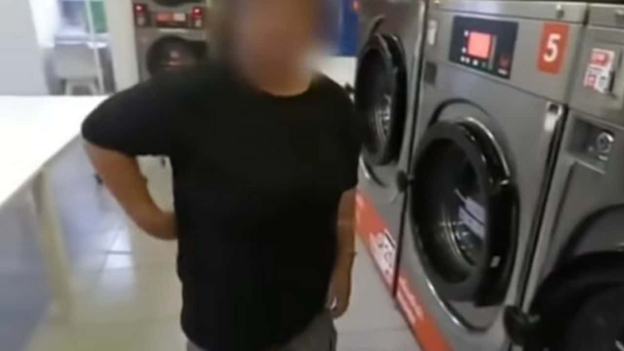 Selfish stranger sneaks clothes into woman's machine
