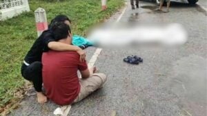 Thai mother fatally struck by son’s car while making merit