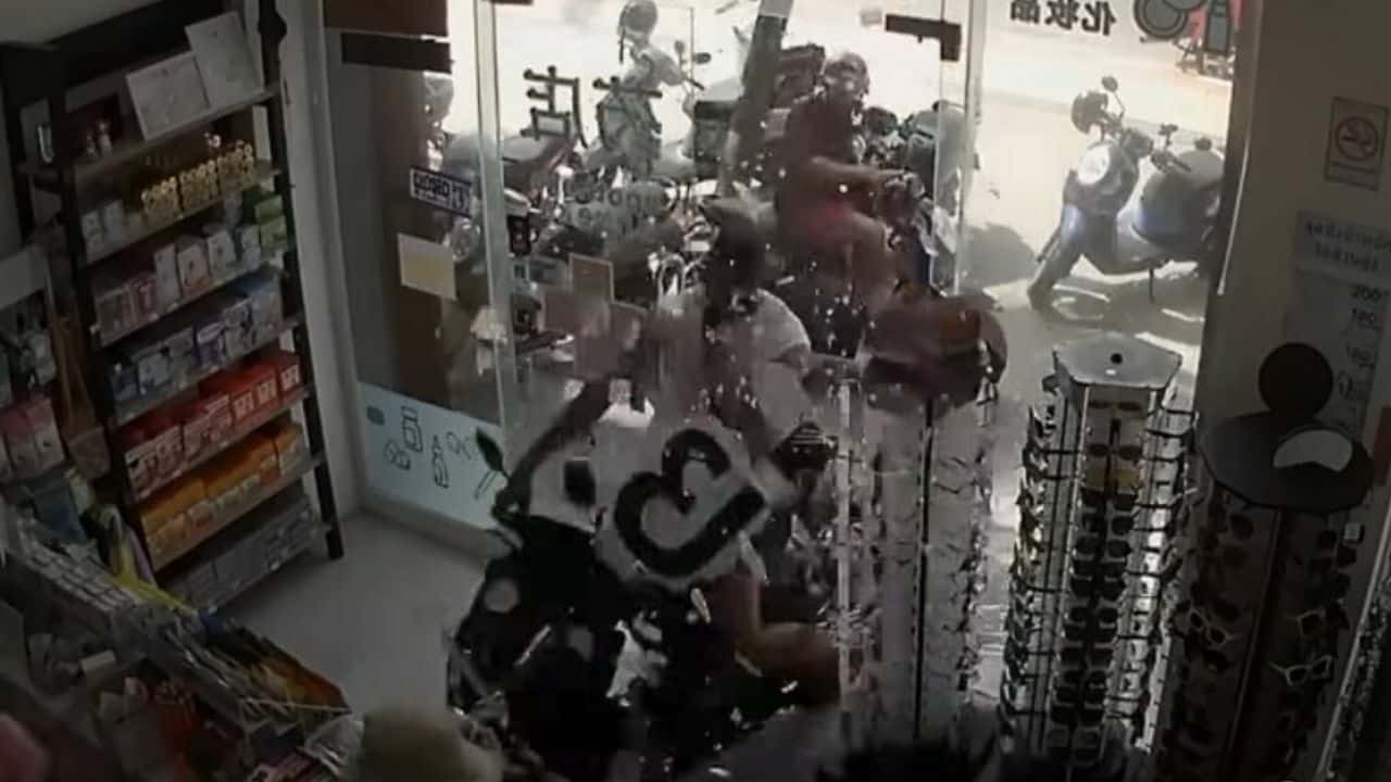 Arab tourist tries to impress woman but crashes motorcycle into Phuket pharmacy