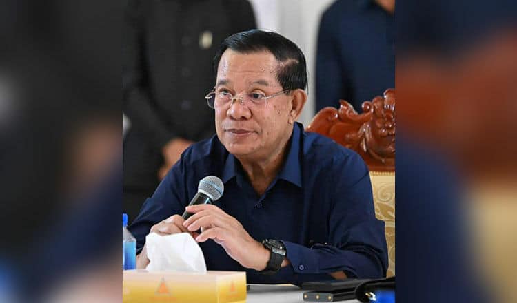 Fermented fury: Barefoot pensioner splashes Hun Sen portrait | News by Thaiger