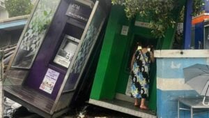 Storming the banks: Tree tops ATMs in Bangkok showdown