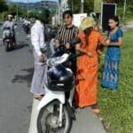 Close shave: Phuket cops rescue woman after scarf snags (video) | Thaiger