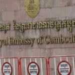 Fermented fury: Barefoot pensioner splashes Hun Sen portrait | Thaiger