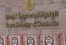 Fermented fury: Barefoot pensioner splashes Hun Sen portrait