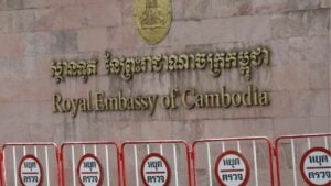Fermented fury: Barefoot pensioner splashes Hun Sen portrait