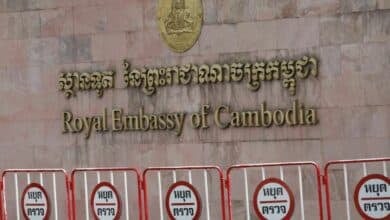 Fermented fury: Barefoot pensioner splashes Hun Sen portrait