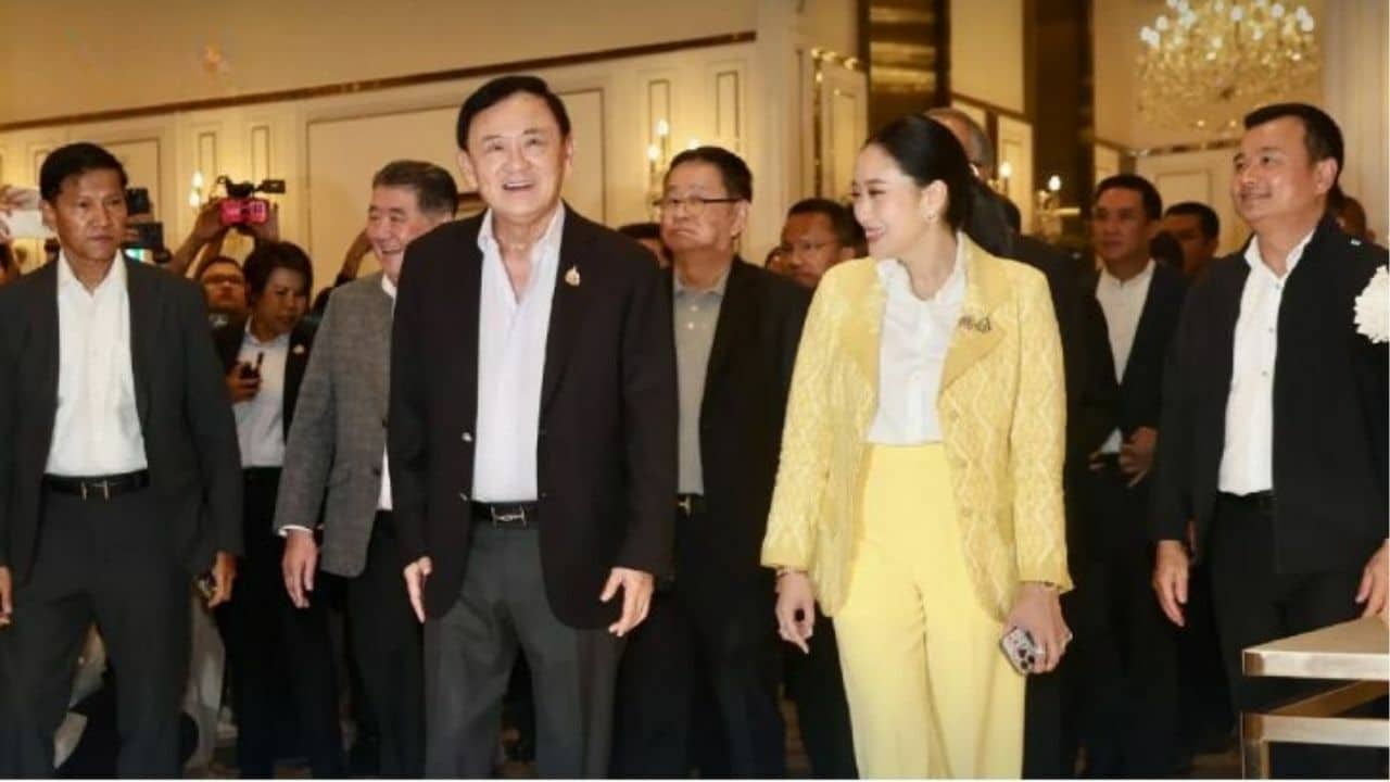 Thaksin calls for unity as coalition cracks show