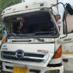 Pole-axed! Trucker trapped in mangled cab after rain-slick smash | Thaiger