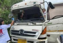 Pole-axed! Trucker trapped in mangled cab after rain-slick smash | Thaiger