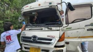 Pole-axed! Trucker trapped in mangled cab after rain-slick smash | Thaiger
