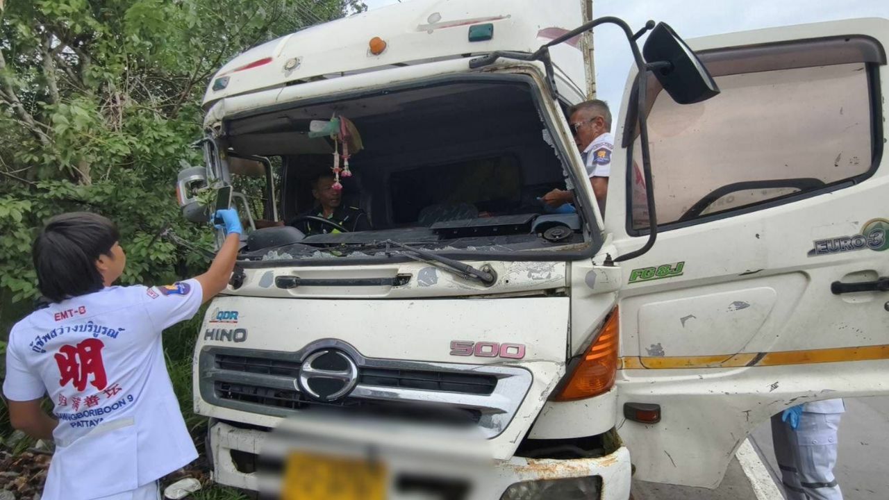 Pole-axed! Trucker trapped in mangled cab after rain-slick smash | Thaiger