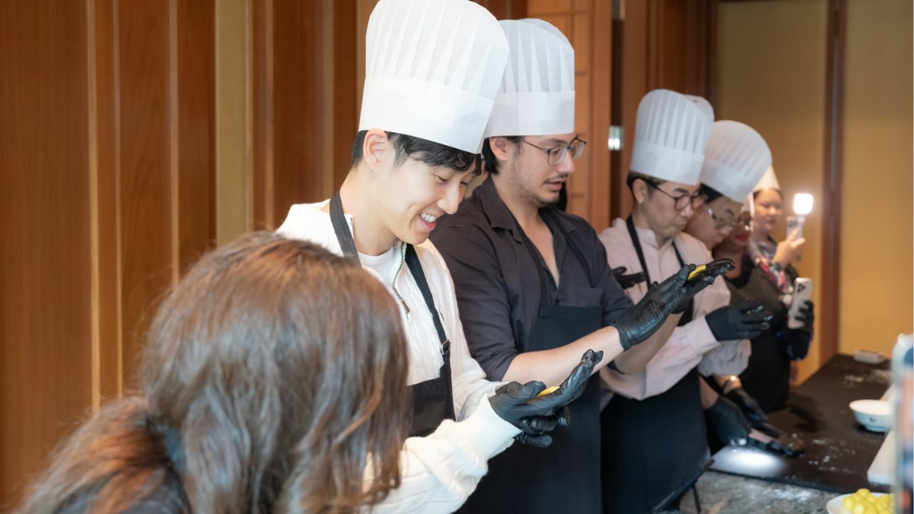 The mooncake making workshop at Mei Jiang at The Peninsula; I am in the black shirt