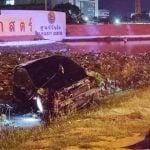 Pickup and sedan plunge into pond after collision near Thammasat | Thaiger