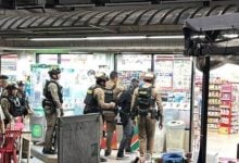 Chinese man with firearm surrenders after Pattaya store standoff | Thaiger