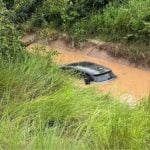 Electric car plunges into canal in Nakhon Sawan, driver escapes | Thaiger