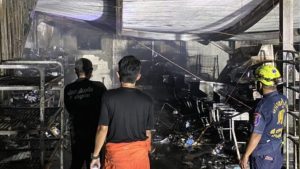 Fire at Chon Buri postal warehouse traps four, causes extensive damage | Thaiger