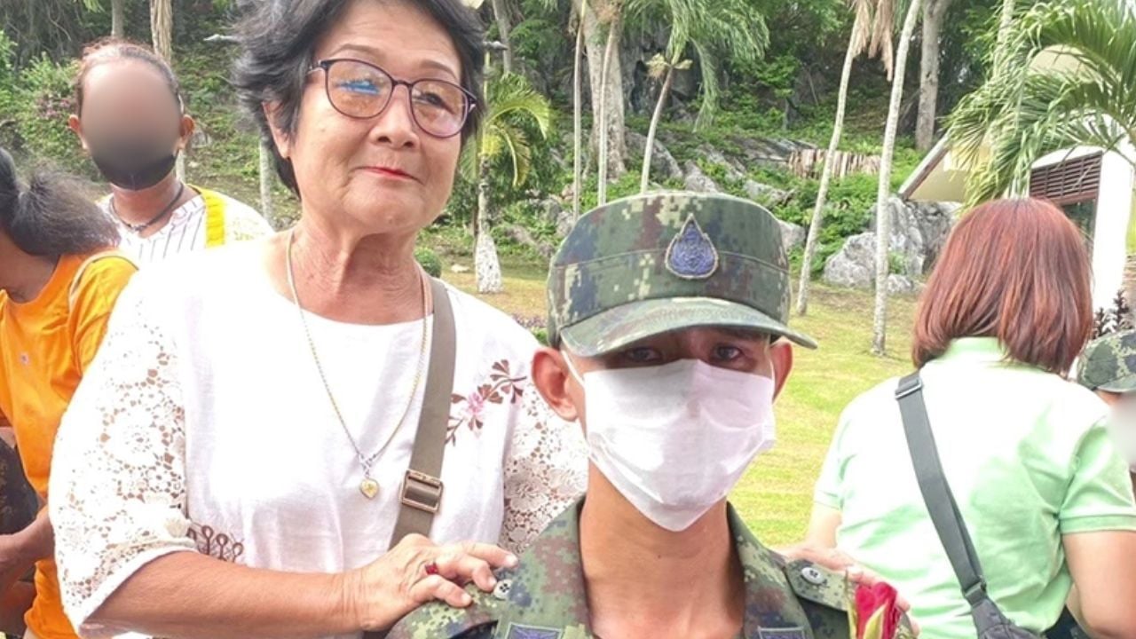 Thai frontline soldier attends funeral of his mother who was killed by female customer