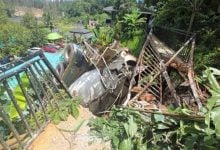 Cement truck flips in dramatic crash near Phuket café | Thaiger