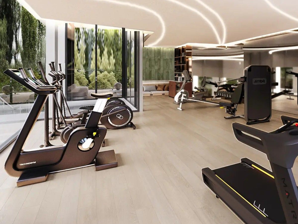 Modern fitness centre with Technogym equipment at Arise Vibe Phuket condominium