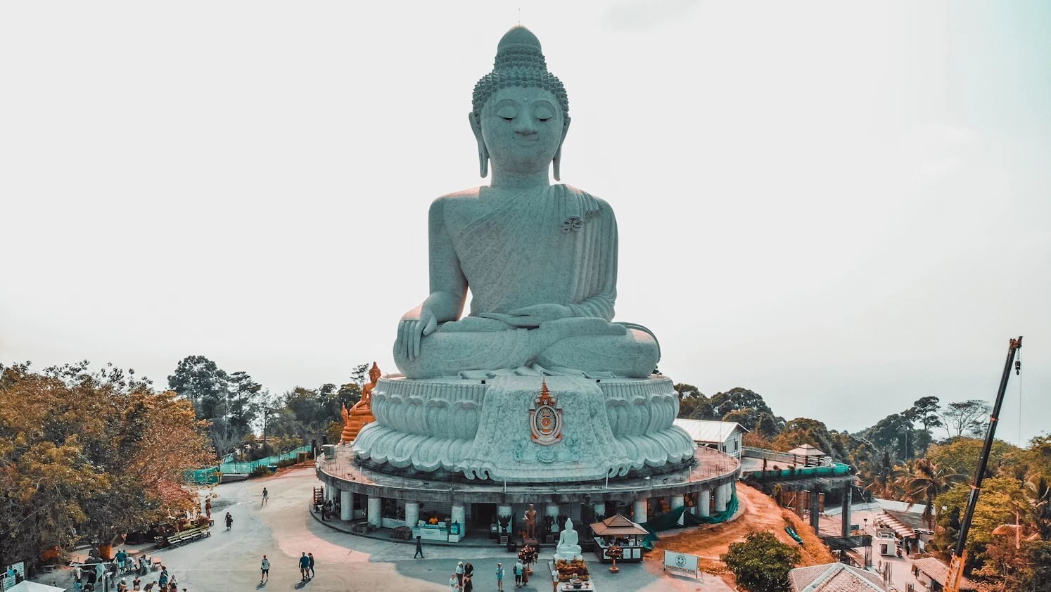 The Big Buddha statue in Phuket, Thailand, standing tall with panoramic island views.