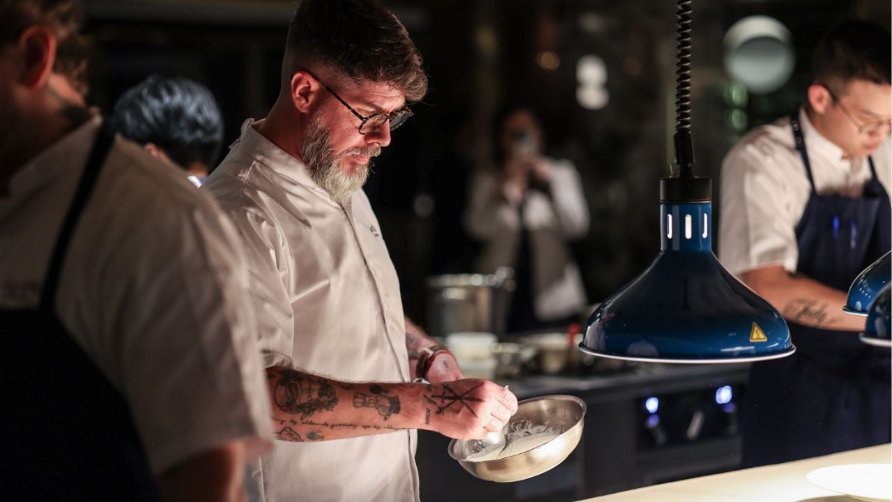 Chef Paulo Airaudo and the team in the open kitchen at Sartoria
