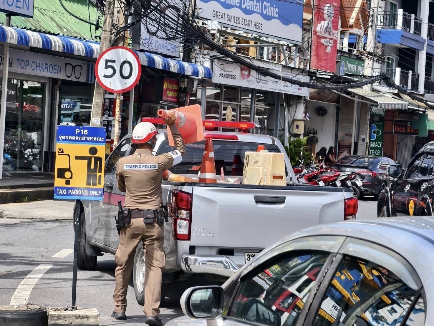 Patong cops swoop on dodgy kerbside parking setups | News by Thaiger