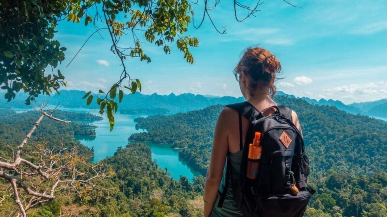 A backpacker at the Khao Sok National Park | PHoto taken from BucketListly Blog website