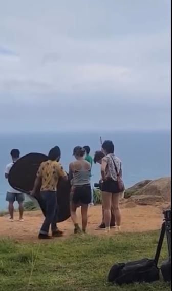 Film crew blasted for rolling up Thai flag at Phuket viewpoint (video) | News by Thaiger