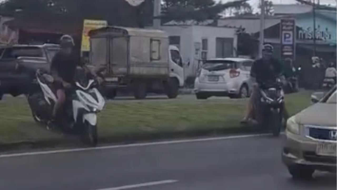 Foreign motorcycle riders dangerous U-turn Phuket