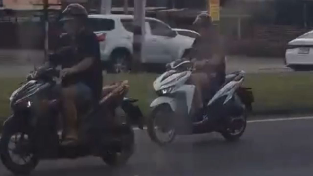 Foreign men spark online criticism for making risky U-turn