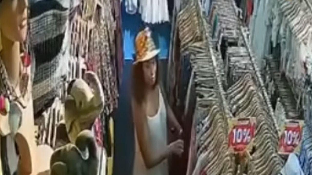 Foreign woman changes price tag to pay cheaper