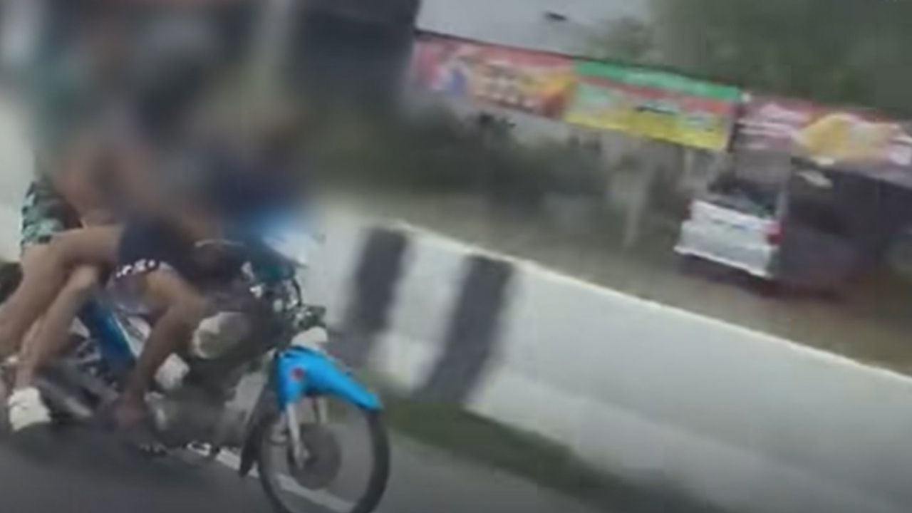Thai woman caught sitting on motorcyclist's lap sparking online drama